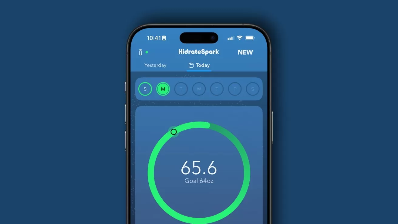 Smartphone displaying a hydration tracking app with a circular progress bar. It indicates 65.6 ounces against a goal of 64 ounces. Minimalist and blue-themed design.