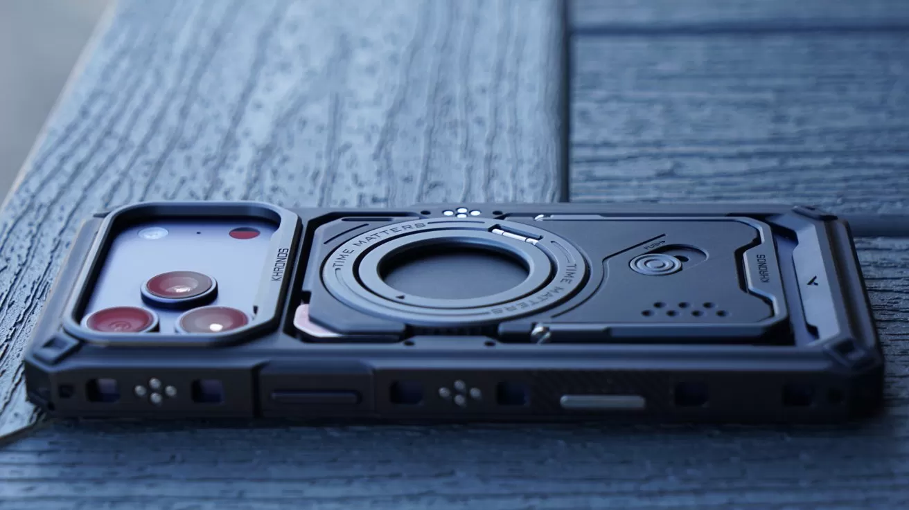 The Tilta Khronos case for iPhone 17 Pro Max with a backplate inserted, showing rugged angular design and metal contacts where accessories mount