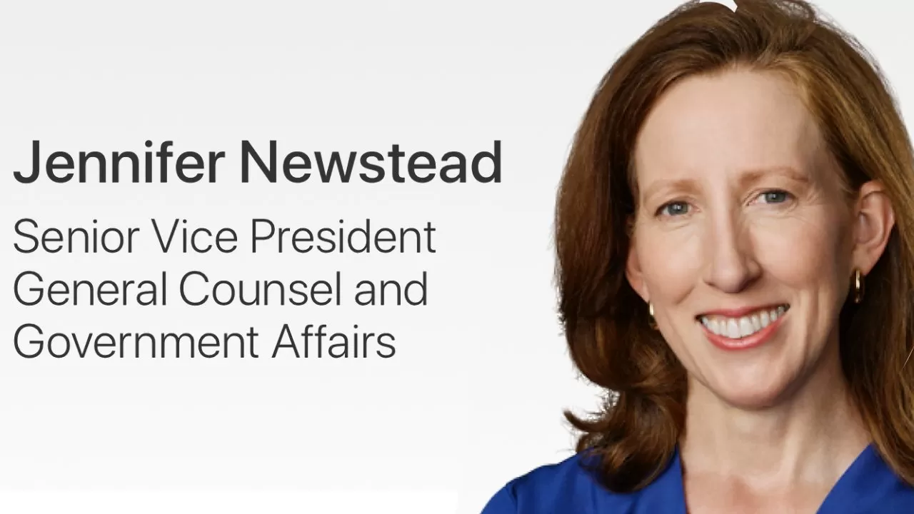 Professional headshot of Jennifer Newstead smiling, with text identifying her as Senior Vice President, General Counsel and Government Affairs on a light gray background