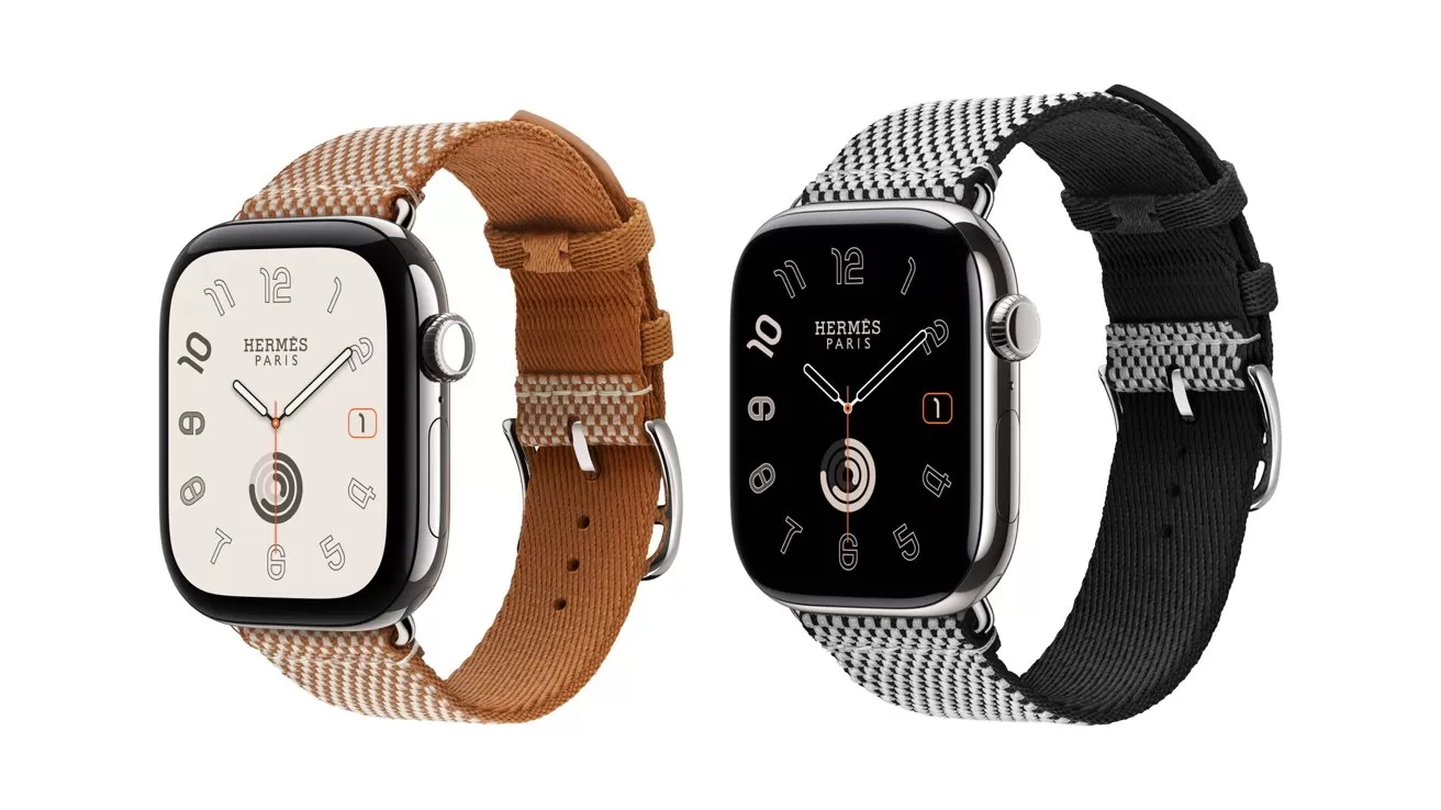 Two Hermes Apple Watches side by side, one with a tan woven band and white dial, the other with a black woven band and black dial, both featuring rounded rectangular faces