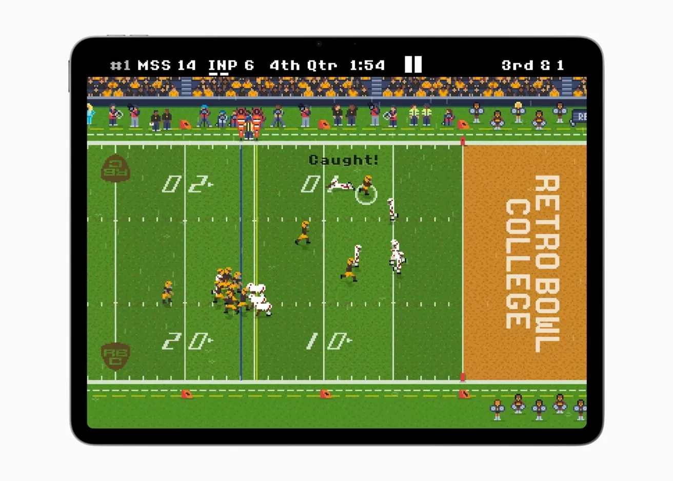 Pixelated American football video game on a tablet, showing a passing play near the end zone labeled RETRO BOWL COLLEGE, with players in yellow and white uniforms and a crowded sideline.