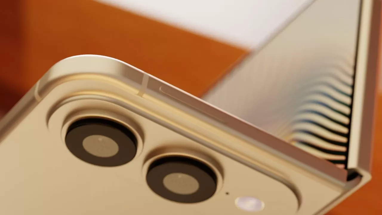 Close-up of a gold foldable smartphone partially open, showing dual rear cameras, LED flash, shiny metal edges, and the reflective inner hinge with striped reflections in warm lighting