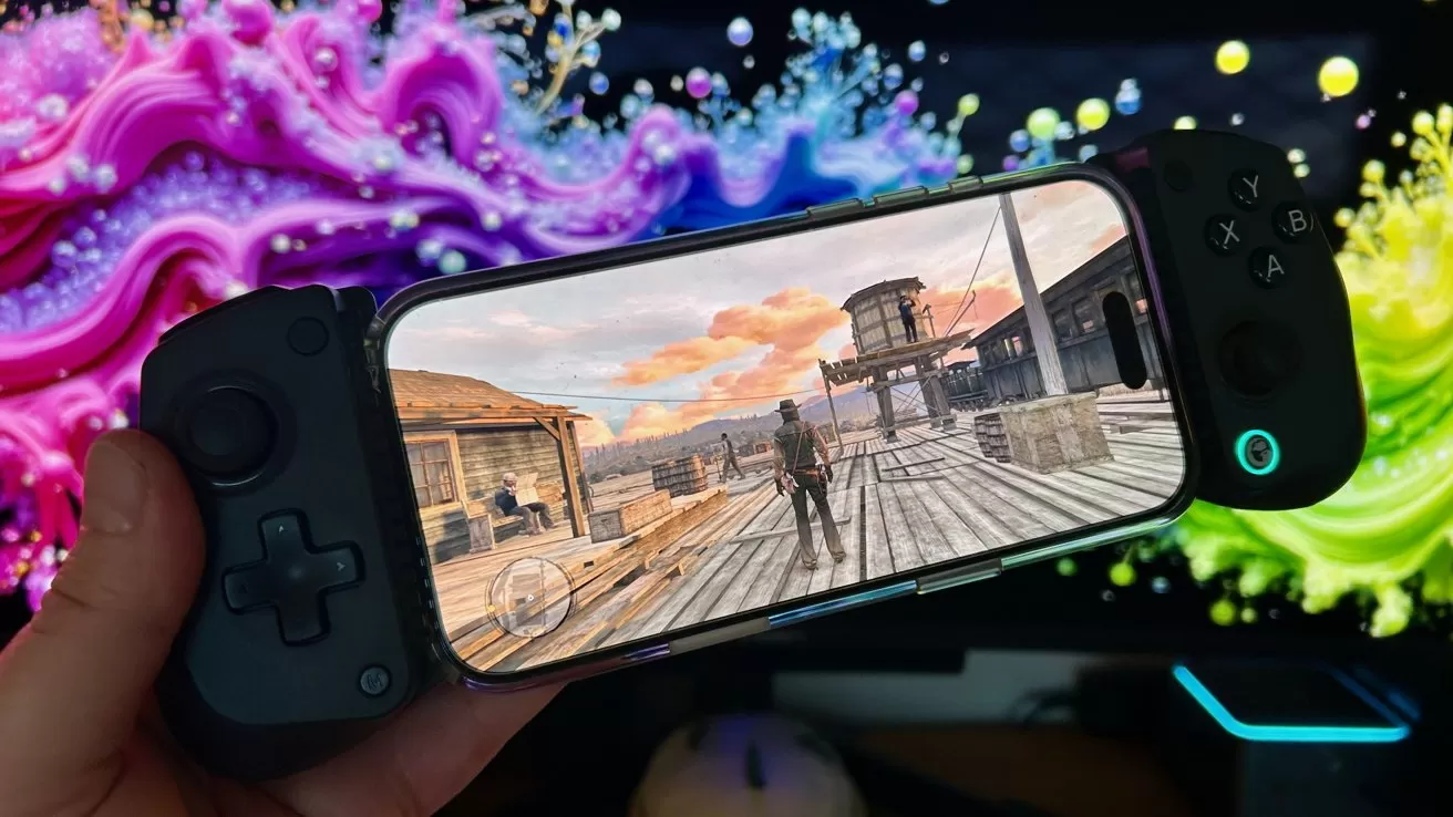 A person holds a smartphone with game controllers attached, displaying a Western-themed video game. A colorful, swirling background adds vibrancy.