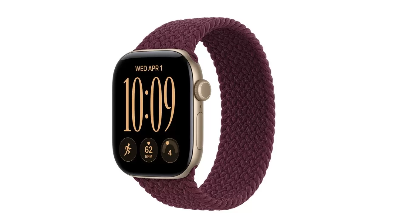 Gold smart watch with rectangular screen and burgundy braided loop band, displaying large digital time 10:09, date Wednesday April 1, and small workout, heart rate, and activity icons