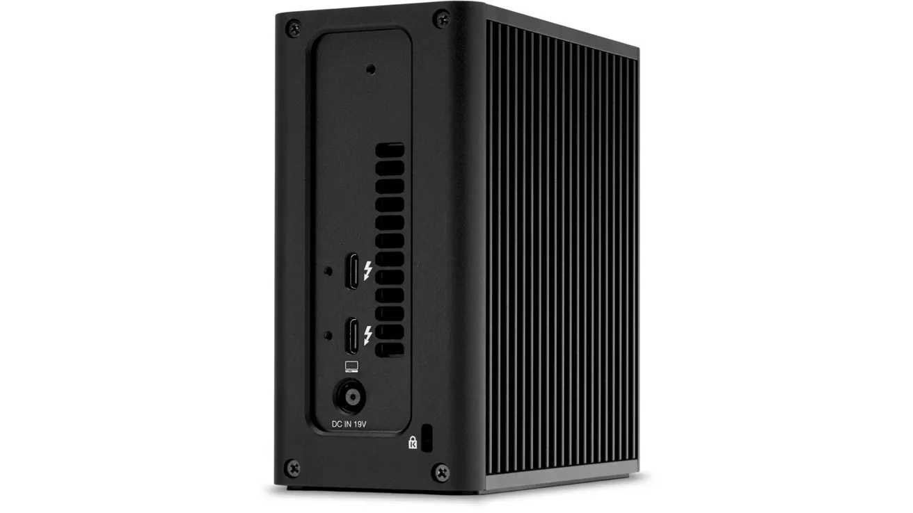 Black OWC Express 4M2 Ultra enclosure with vertical cooling fins and two rear Thunderbolt ports