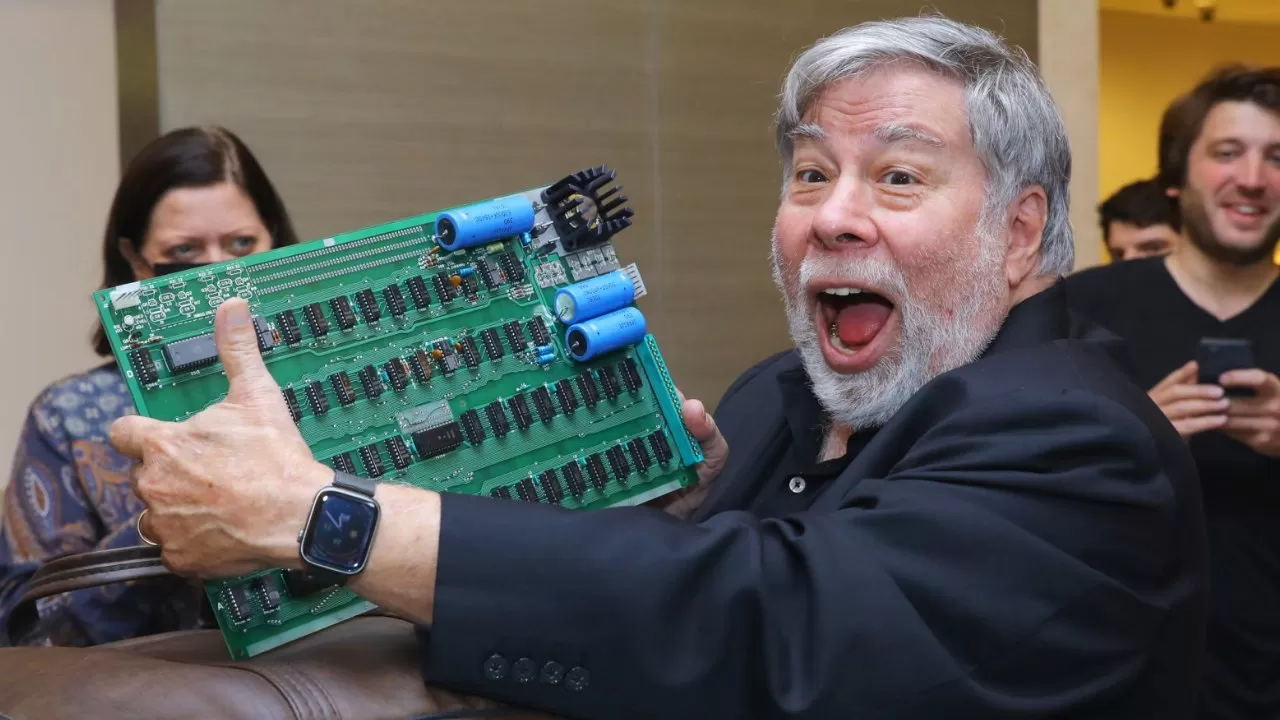 Woz with an Apple I motherboard in 2022