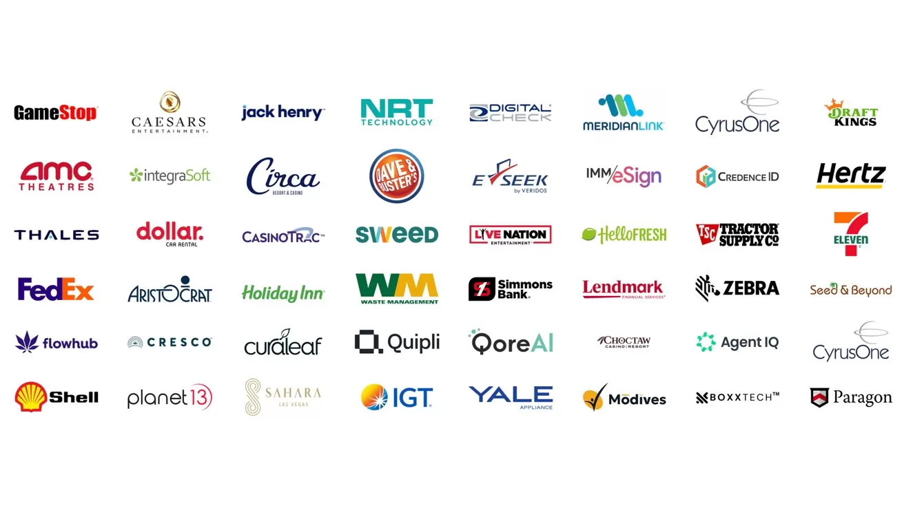 Grid of colorful corporate logos from many well-known brands across various industries, such as retail, finance, entertainment, logistics, technology, energy, hospitality, and healthcare, arranged on a plain white background